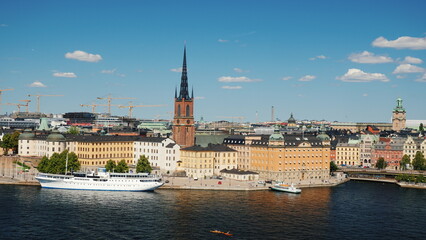 Fototapeta premium Pan shot of the city of Stockholm. A clear sunny day in the capital of Sweden