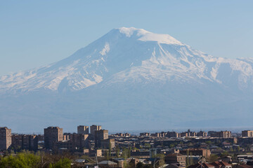 Yerevan, Armenia - April 2022: The view over the city of Yerevan and a snow peak of the mountain of Ararat in the background