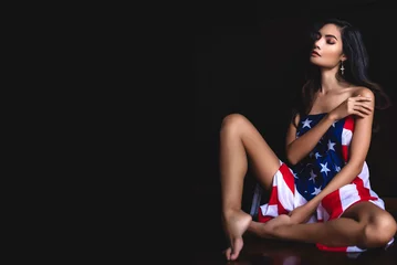 Foto op Plexiglas Beautiful and sexy Asian lady in white bra lingerie and The United States of America flag in balcony room with dark wall background  © totojang1977