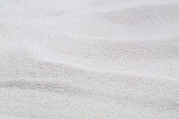 Fototapeta na wymiar Pure white sand as background