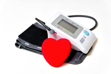 Blood pressure monitor with red heart on white