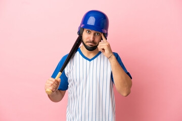 Baseball player with helmet and bat isolated on pink background thinking an idea