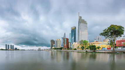 Fototapeta na wymiar Panorama of Ho Chi Minh City on the banks of the Sai Gon River before the coming rain.