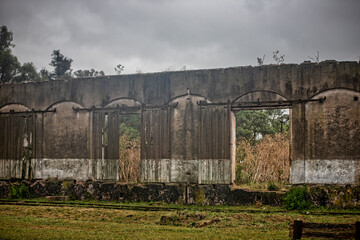 Fototapeta na wymiar Old abandoned building in the rain