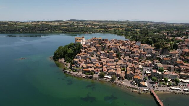 Scenic lake Lago di Bracciano, aerial view of scenic village Anguillara Sabazia. Popular for short trips from Rome. Lazio region