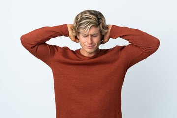 English man over isolated white background frustrated and covering ears