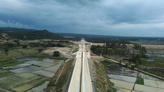 An aerial view of the construction process for the Sigli Banda Aceh (Sibanceh) Toll Road, Aceh, Indonesia.