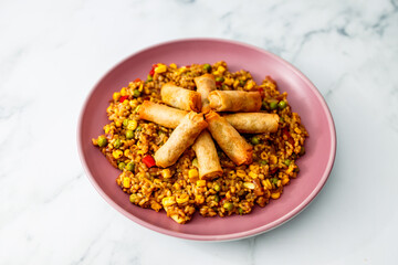 healthy plant-based food, vegan fried rice with vegetable spring rolls