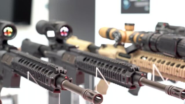 Detail view of the telescope part of a military weapon sniper placed on a tripod. Army weapons industry. video 4k.