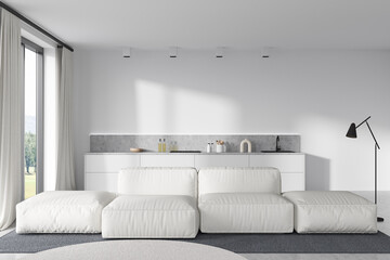 Kitchen interior with couch and kitchenware on deck, panoramic window