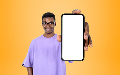 African man show smartphone, mockup display on bright background
