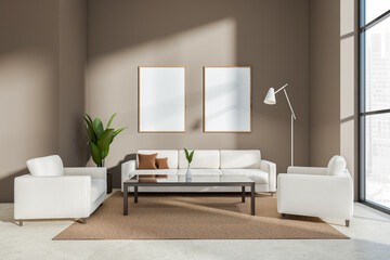 Light living room interior with sofa near window, mockup frames