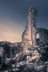 Stone ruins of Byland Abbey, a former monastery in North Yorkshire, typcial of medieval Gothic architecture.