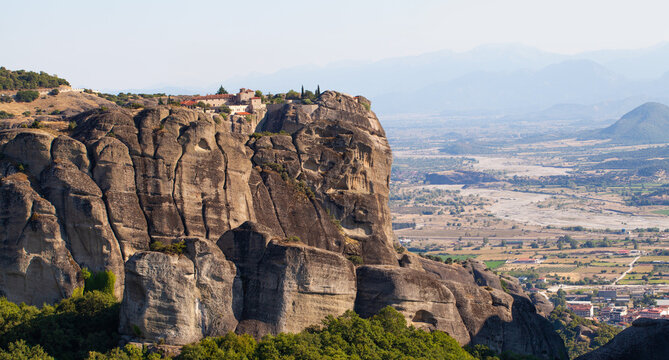 Kalampaka town with Metora cliffs and monastery, Greece.