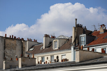 The famous Parisian attics (mansard roofs) on the top floors of 19th-century Haussmann houses