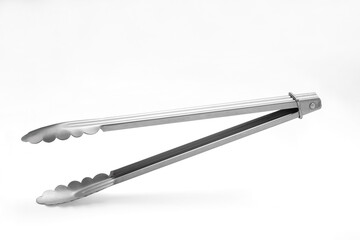 Serving kitchen tongs on white.