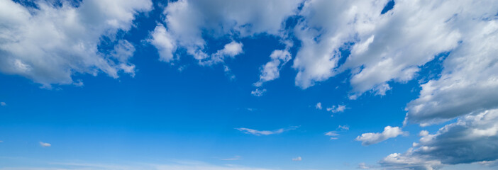 White clouds in blue summer sky panoramic  background