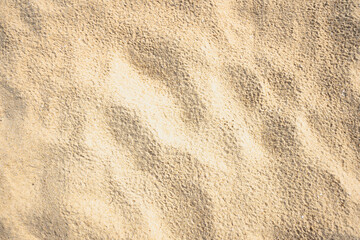 Fototapeta na wymiar Golden sand nature shore dune desert clean beach background.