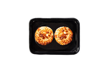 Cupcakes in retail package. Isolated on a white.