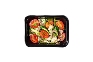 Healthy meal, container with beef salad. A set of food for keto diet in a plastic container isolated on white. Top view