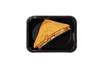 wholegrain sandwich with chicken and vegetables in a plastic container. food delivery, takeaway