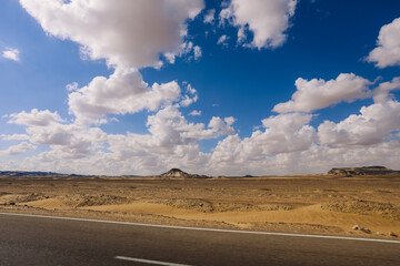 Panoramic View to the Sandy Hills in the Black Desert, is National park in the Farafra Oasis, Egypt