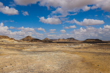 Panoramic View to the Sandy Hills in the Black Desert, is National park in the Farafra Oasis, Egypt