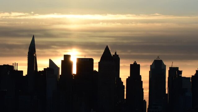 Manhattan skyline skyscrapers close up silhouette 4k video, sunrise sky, travel tourism theme 4k resolution.