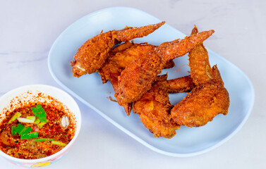 fried chicken wings with sauce