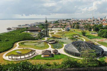 Aerial view of Mangal das Garças, landscaped gardens with a riverside observation tower & ponds....