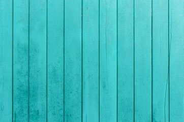 Fototapeta na wymiar Old turquoise wooden panel texture as background.