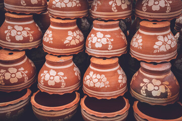 Row of garden pots for plants and seedlings