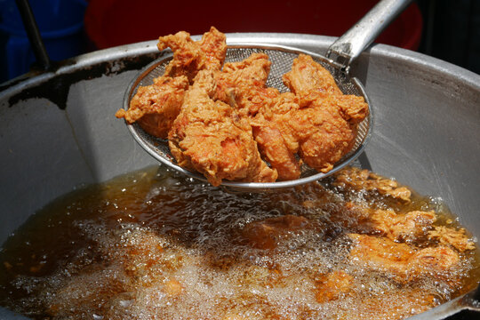  Fried chicken in deep fry outdoor 