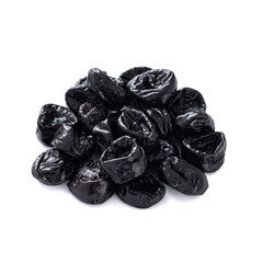 a small pile of fresh prunes lies isolated on a white background