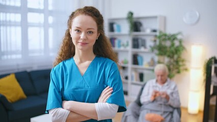 Portrait of nurse in retirement home, assisting and supporting mature people