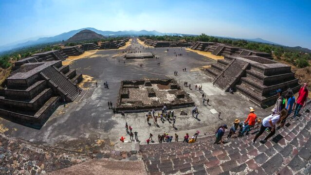 Time lapse view of tourists climbing the Pyramid of the Moon at the ancient Aztec city of Teotihuacan near Mexico City, Mexico.