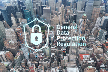 Fototapeta na wymiar Aerial panoramic roof top city view of New York City Financial Downtown district at day time. Manhattan, NYC, USA. GDPR hologram, concept of data protection regulation and privacy for all individuals