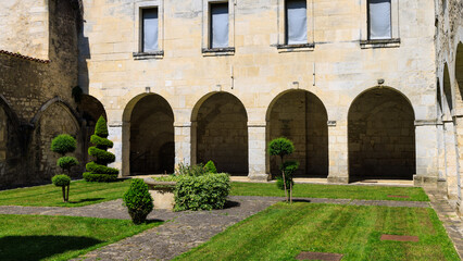 Fototapeta na wymiar Cognac, France - April 25, 2022: Courtyard of old building tourist office Cognac in Charente France