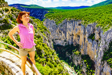 Woman enjoying mountain view, Verdon Gorge in France.