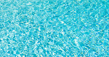 rippled water blue color in summer swimming pool