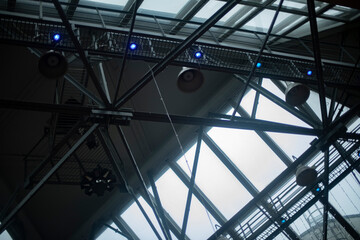 Roof is made of steel beams. Windows in roof.