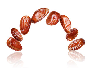 Delicious dried dates in the air closeup on a white background