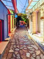 Fototapeta na wymiar preveza city setan pazar alleys with colored houses and restaurants greece