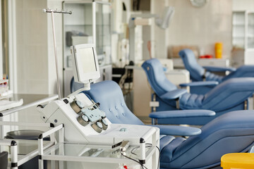 Background image of modern equipment and med chairs in row at blood donation center, copy space