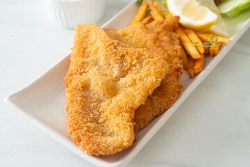 fish and chips - fried fish fillet with potatoes chips