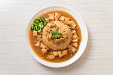 Chicken in brown sauce or gravy sauce with rice