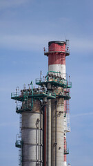 Oil refinery tower and chimney