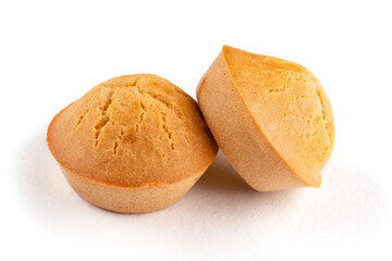 Two homemade rice muffins on a white isolated background. Rice flour cupcakes. Breakfast with a gluten-free diet. Proper nutrition. Template, design.