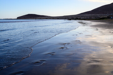 Evening on sandy beach in El Medano, south of Tenerife island, Canary, Spain