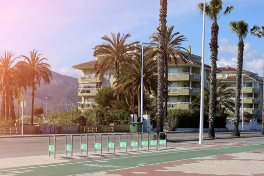 Empty Bike Parking. Parking Space Or Spot For Multiple Bikes. Place For Parking At The House Or Shop Of Bicycles Or Scooters, Environmental Transport In The Resort City.